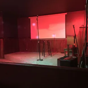 a stage with a red light