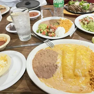 cheese enchiladas without the sauce just more cheese on top 10/10 and the beans with chips 100/10