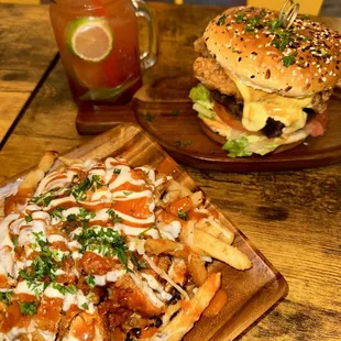 a burger and fries on a table