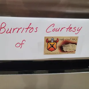 a sign on a refrigerator