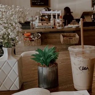 n open book and a cup of coffee