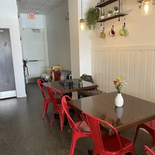  long table with red chairs