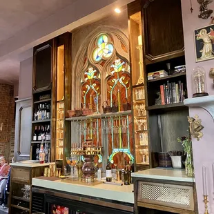 Gorgeous stained glass behind the bar