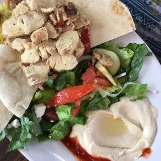 8. Chicken with Creamy Sun-Dried Tomato Sauce , Hummus, Rice, Greek Salad, and Pita Lunch