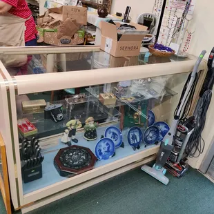There are two display cases with collectables