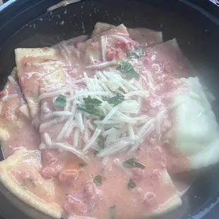 Red pepper sauce with five cheese ravioli