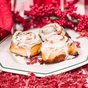 a plate of cinnamon rolls
