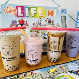 Milk tea, strawberry banana slush, brown sugar milk tea, taro milk tea
