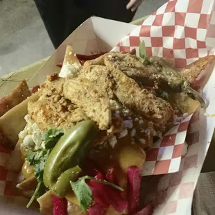 Pita nachos with chicken. Different and unique but in a good way !!