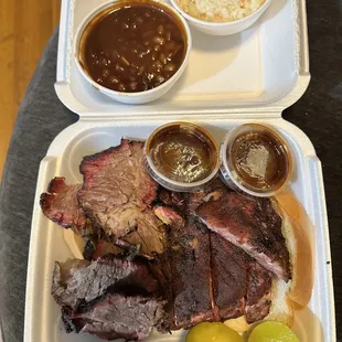 Brisket, ribs, homemade pickles,  beans, slaw