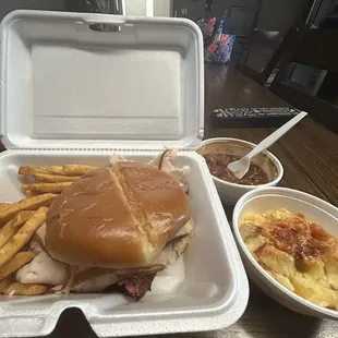 Brisket/Turkey sandwich with fries. Side of baked beans and potato salad.