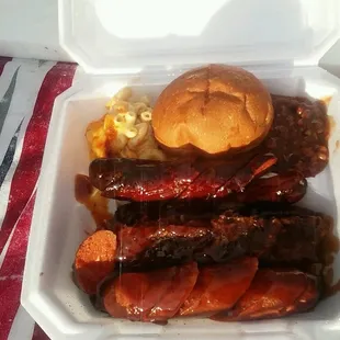 a meal in a styrofoam container