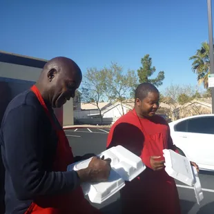 Steven and Lee getting orders to fill. Holysmoke BBQ at its best