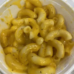 Mac and Cheese, well pepper and cheese. Bland and sour tasting.