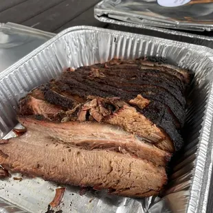 Smoked Brisket 13lbs 5 chickens, buns, cream corn, mashed potatoes, and the world's best and most unique BBQ sauce I've had yet!