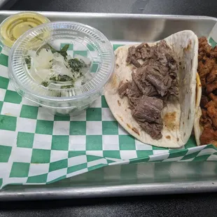 Pastor and barbacoa tacos.