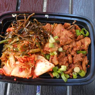 bowl with roasted potato and carrot rice, firecracker beef,kimchi,seaweed salad,and green bean