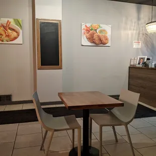 a table and chairs in a restaurant