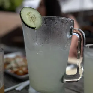 Pitcher of craft cucumber cocktail