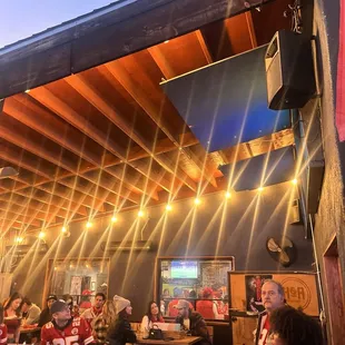 Outside bar area during football game