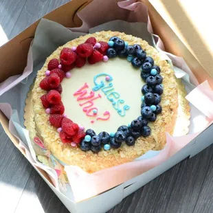 Raspberry Napoleon cake for a gender reveal party, pink or blue inside