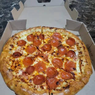 Medium Stuffed crust pepperoni. They glaze the crust with butter