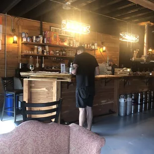 a man standing at the bar