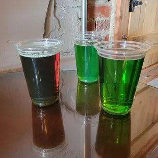 three different colors of beer