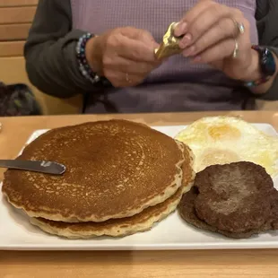 Buttery Vanilla Pancakes!  Two over easy eggs!  Deeeelishes sausage patties!