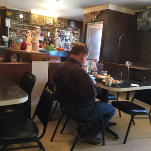 a man sitting at a table