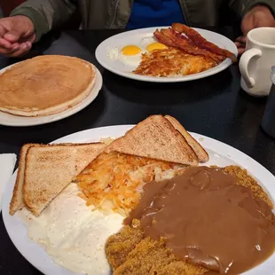 Chicken and gravy, over medium eggs, hashbrowns and toast!