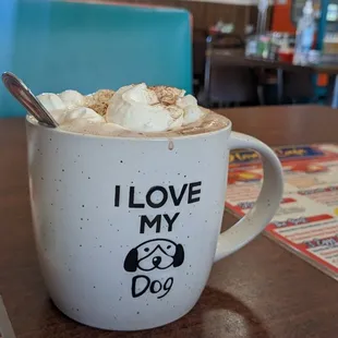 Hot chocolate in a giant mug, topped with whipped cream. Delicious!