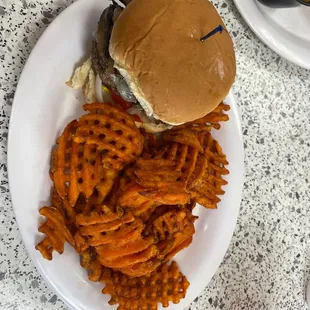 Mushroom and Swiss burger with sweet potato fries