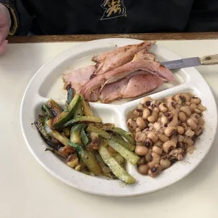 Baked ham with black eyed peas and grilled zucchini.