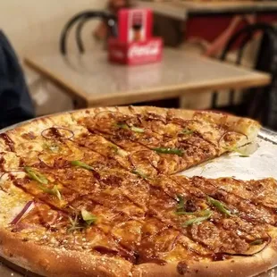 a slice missing from the pizza