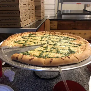 20 inch olive oil with pesto and cheese.