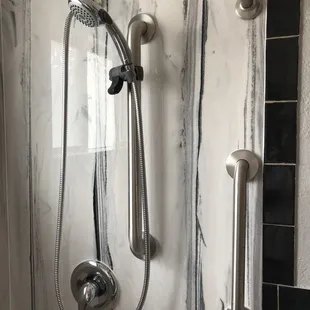 a shower head and hand held shower head