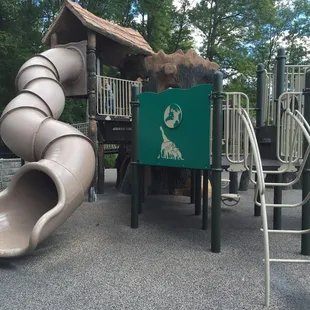 Playground equipment with a large slide.