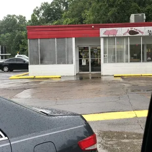 a car parked in front of a store