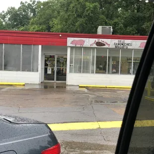 a car parked in front of a store