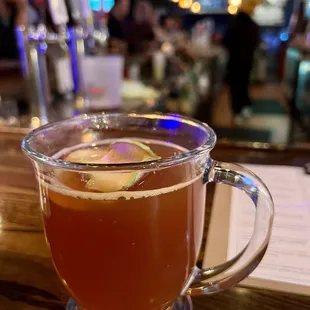 Hot Cedar with Vikre Boreal Gin, Tattersall Cranberry, Tattersall Orange Crema, and hot apple cider