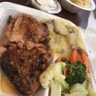 Baked BBQ Chicken Plate with (super buttery) boiled potatoes and mixed veggies. The chicken was amazing.