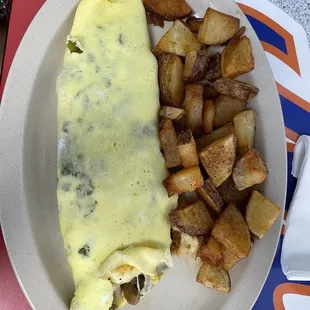 RBI with home fries. One yummy omelette! Home fries-crispy on the outside, we'll seasoned.