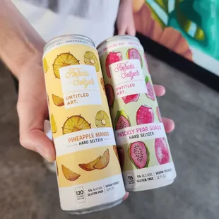 2 of their hard seltzers Pineapple Mango &amp; Prickly Pear Guava