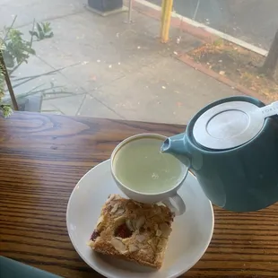 Pot of tea and raspberry almond bar