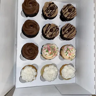 4 Cafe mocha, 2 funfetti, 3 almond wedding and 3 classic chocolate cupcakes
