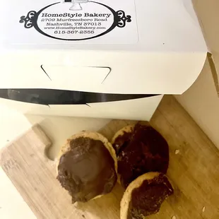 a box of chocolate covered donuts