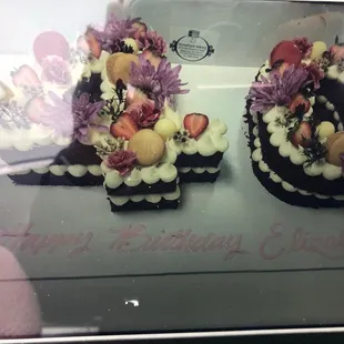 This 40 cake was red velvet with cream cheese frosting. The fruit was fresh and the cookies were like popping magic in my mouth.