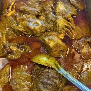 Palmnut or Banga Soup cooked to perfection with your choice of meat, seafood or poultry Serve with rice or fufu