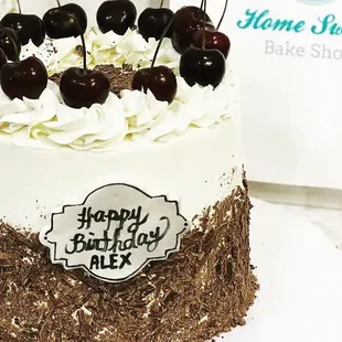 a cake with cherries on top